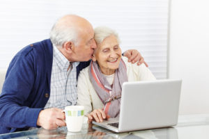 Senior couple on a laptop