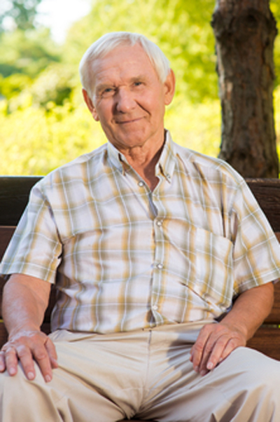 Senior man sitting on bench