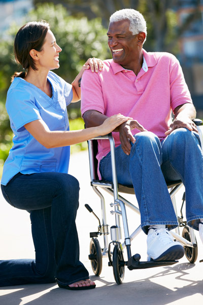 Female home health aide providing companionship services for loved one