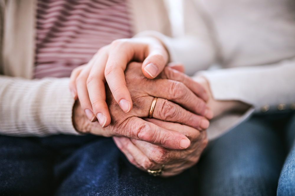 Couple holding hands