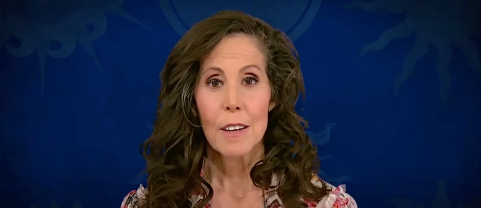 A person with brown hair Description automatically generated with low confidence
